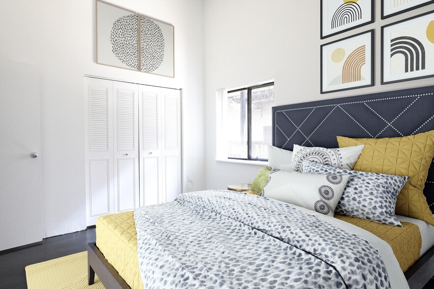 Courtyard Bedroom Yellow Bed - Ford Factory Lofts