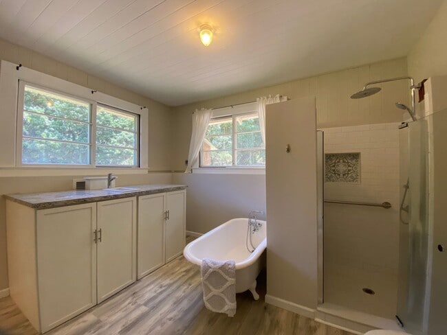 Building Photo - Furnished Plantation Home with 3 Bedrooms, 2 Bath large enclosed porch on almost 2 acres with oce...