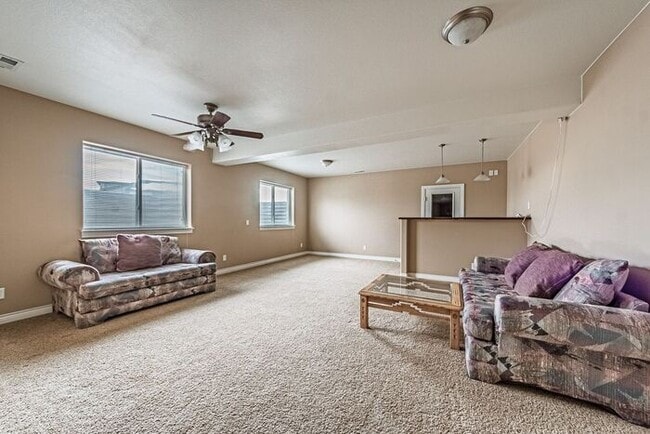 Building Photo - Stunning 5BR Home with Luxury Master Suite & Low-Maintenance Yard!