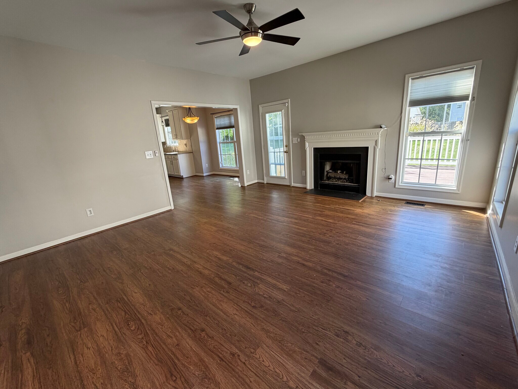 This view of the Den shows the French door access to the rear deck and backyard - 6419 Woodmont Rd