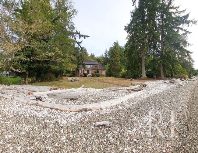 Building Photo - Waterfront Tudor | Private, Vintage Charm with Casita