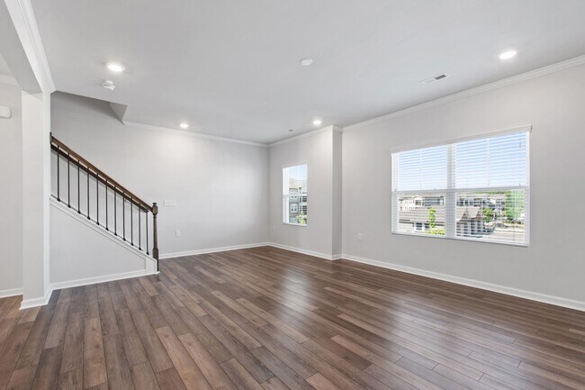 Building Photo - Bright, Spacious & Move-In Ready Townhome ...