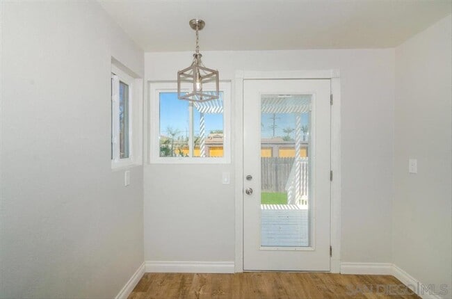 Building Photo - Remodeled 3 bedroom 2 bath.  Fenced yard. Outdoor shower, deck ,attached garage. Near beaches.