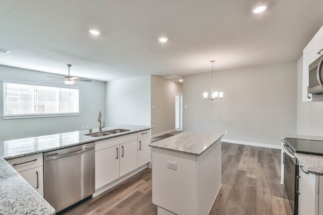 Building Photo - High Ceilings, Low Maintenance -Say Hello ...