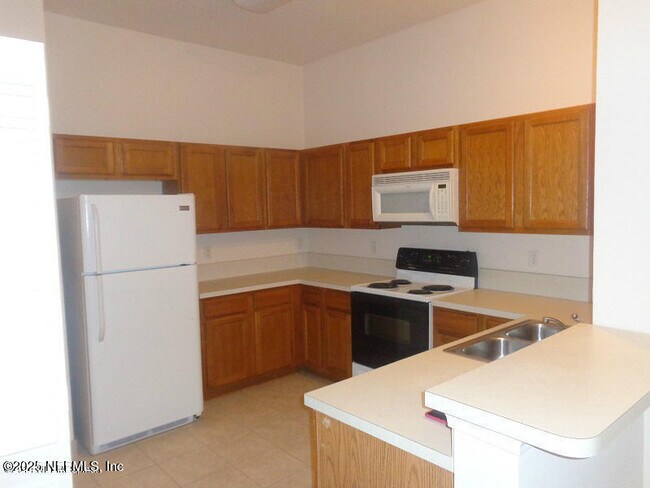 Building Photo - 9595 Amarante Cir