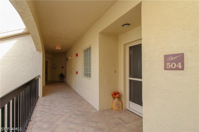 Building Photo - 7024 Pelican Bay Blvd