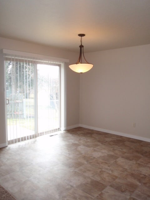 Building Photo - Newer house with attached garage. Half mon...