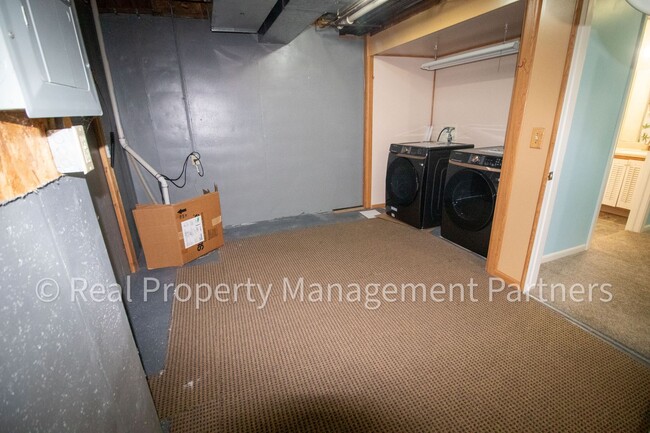 Building Photo - Forest Hills 3 Bed Townhome with Garage, Pond View and Some Utilities Included