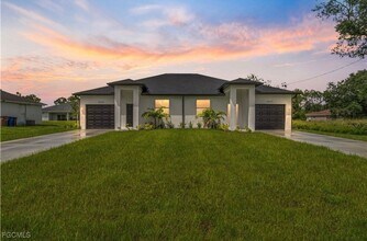 Building Photo - Charming 3BR Duplex in Lehigh Acres