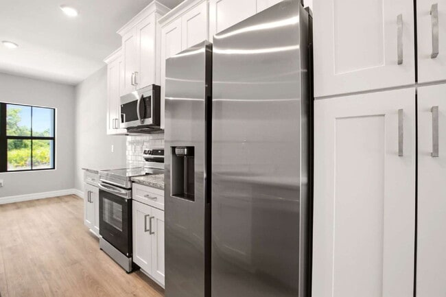 Building Photo - Brand New 4-Bedroom Gem with 2 Full Baths A Magical Space For Your Family!