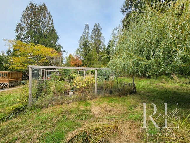 Building Photo - Waterfront Tudor | Private, Vintage Charm with Casita