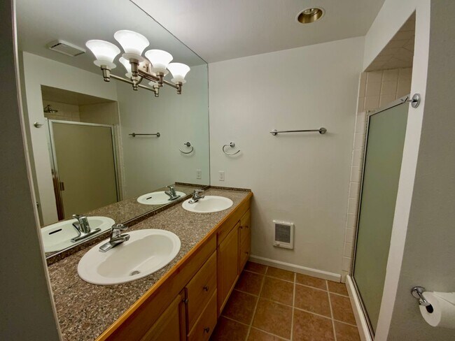 Building Photo - 1,300+ Sq Ft 2BR Condo w/ Parking, W/D & Utilities Included | $1,000 Move-In Credit