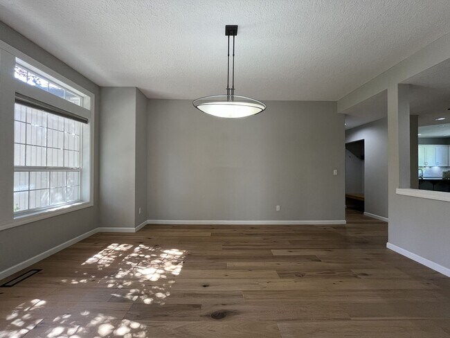 Building Photo - Beautifully Updated 3-Bedroom Bethany Home with Chef's Kitchen, Huge Bonus Room and Private Backyard