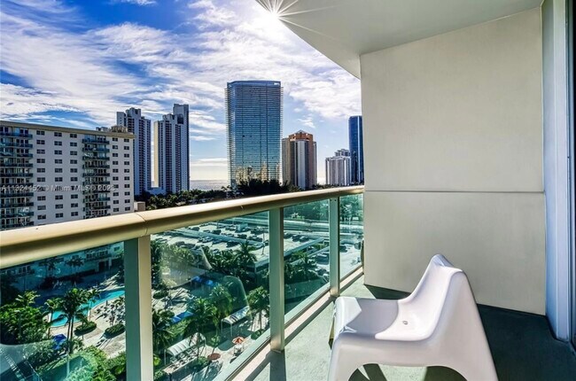 Building Photo - 19380 Collins Ave