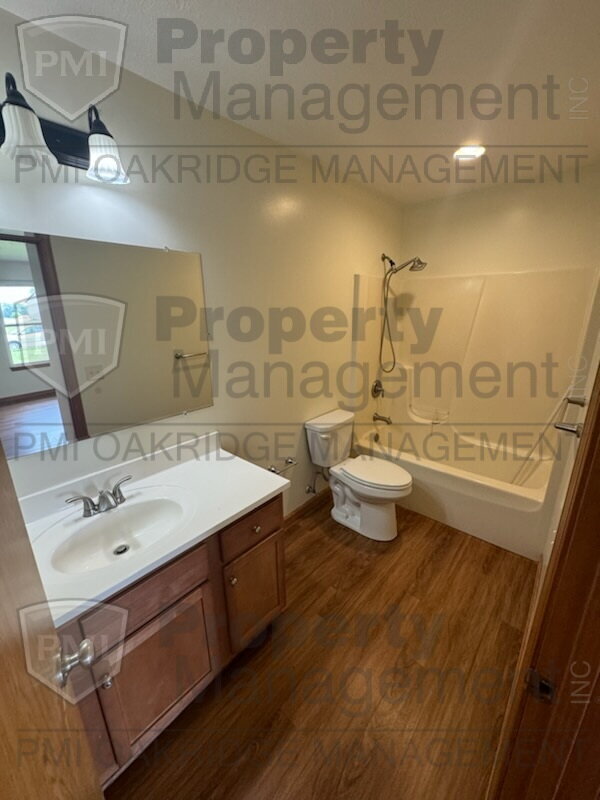 Building Photo - Country 3 Bedroom Apartment with 2 Car Garage