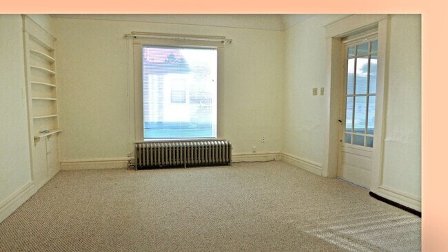 Building Photo - 210 E Tenth St