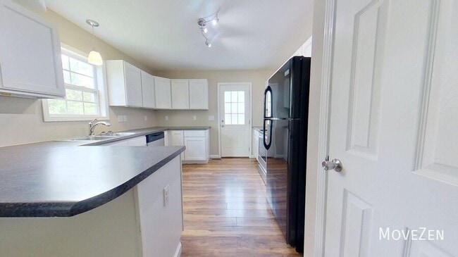 Building Photo - 5940 Brentwood Park Pl