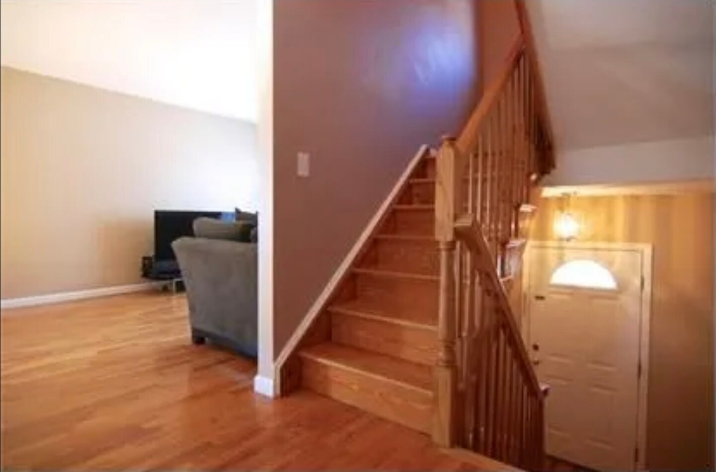 Front entry, stairway, opening to sunny living room - 103 Prescott Ave