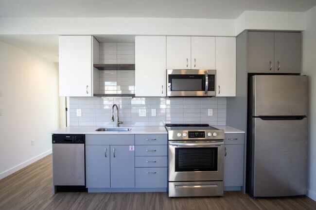 Building Photo - Spacious 1-Bedroom w/Condo-Grade Finishes + Balcony!