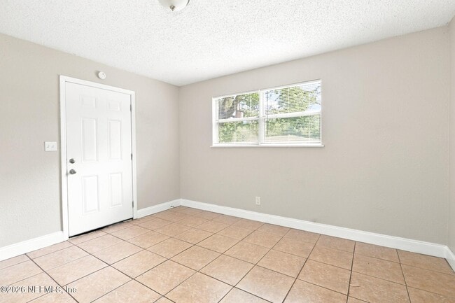 Building Photo - 6813 Tinkerbell Ln