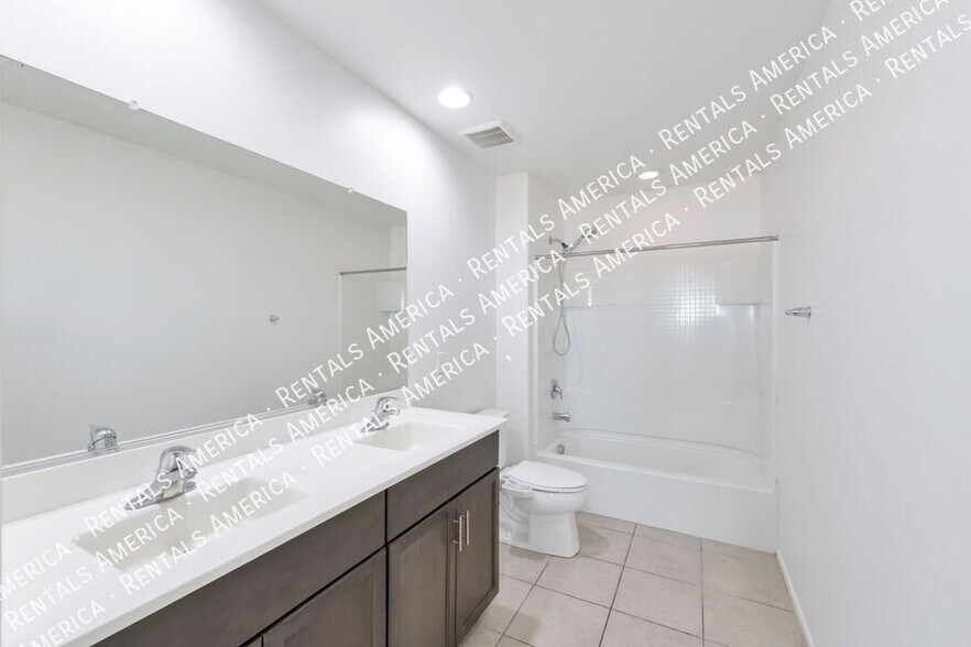 Building Photo - 6952 W Hedge Rose Dr