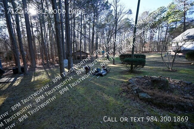 Building Photo - 7122 Ramblewood Dr