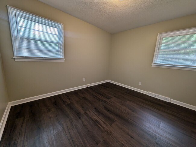 Building Photo - **Price Reduced with Lawncare included!