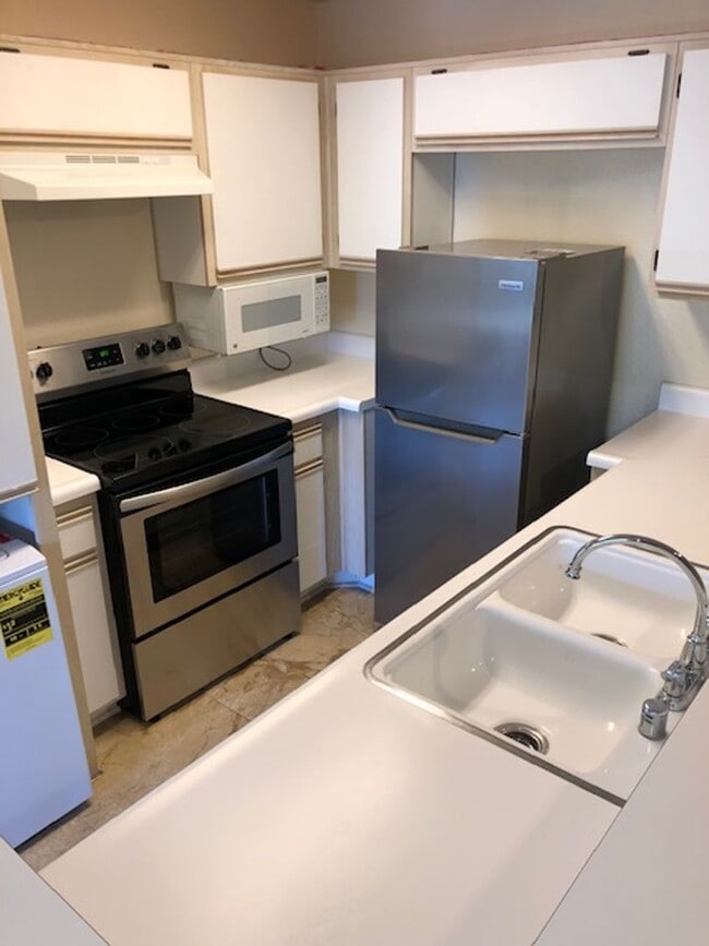 Building Photo - 1 Bedroom Luxury Living . . .  with 2 gated parking spots