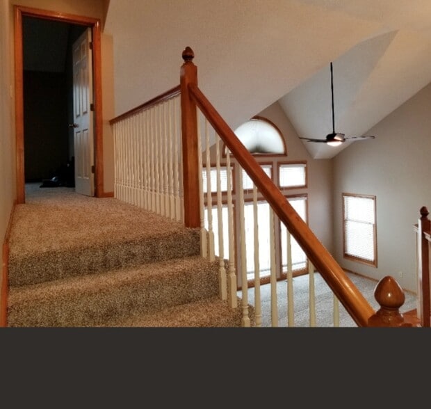 Walkway to master overlooking living area - 21506 W 53rd Terrace