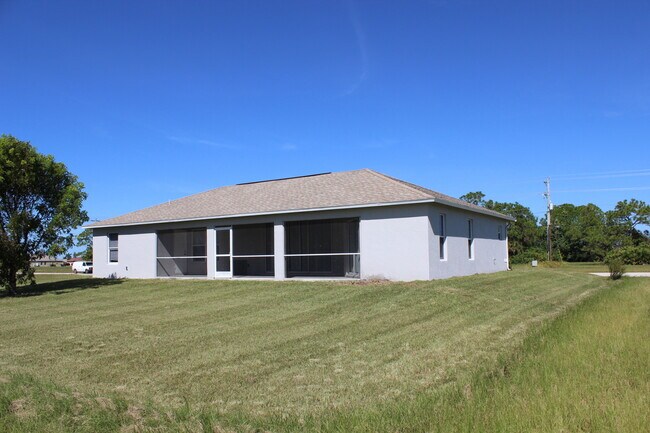 Building Photo - ** FIRST MONTHS RENT FREE** Quiet and Spacious Single Family Home in NW Cape Coral