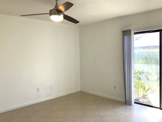 Building Photo - 10128 Boca Bend E