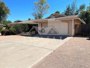 Building Photo - 5129 E Emile Zola Ave