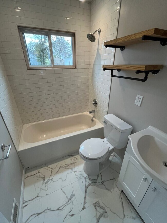 Building Photo - Spacious 3-Bedroom Ranch with 2-Car Garage & Oversized Fenced Backyard