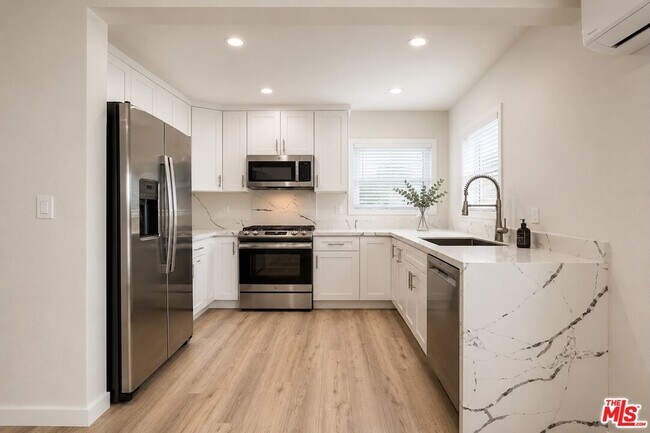Building Photo - 5250 Whitsett Ave