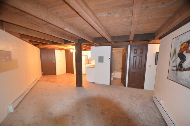 Building Photo - A 6 month lease at a 12 month rate include...