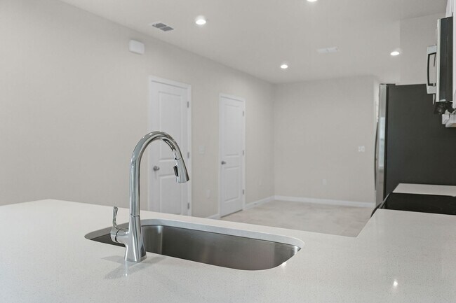 Building Photo - Brand New ~ 3/2.5 End Unit Townhome w/ Sty...