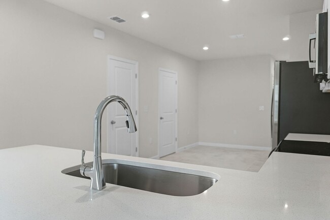 Building Photo - Brand New ~ 3/2.5 End Unit Townhome w/ Stylish Upgrades!