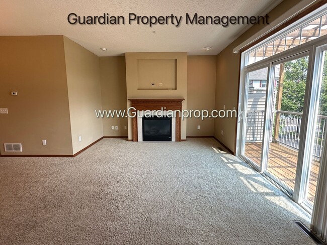 Building Photo - Pet Free Champlin Town Home, 3.5 Baths, 2 Car Garage, Dishwasher, Balcony, Available end of April