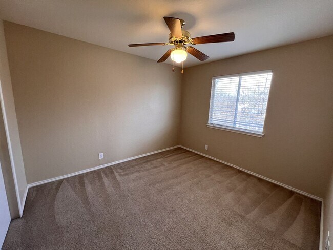 Building Photo - Generous Outdoor Space & Lawn Care Included!