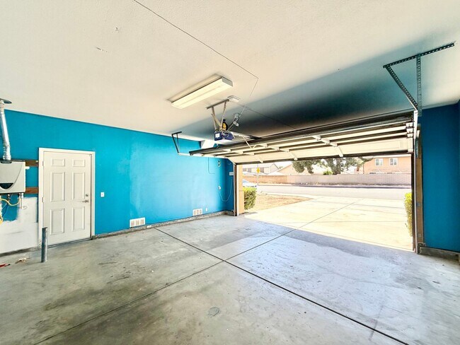 Building Photo - Beautifully Renovated 4 Bedroom Home with INCLUDED Solar, Large Backyard & Gazebo