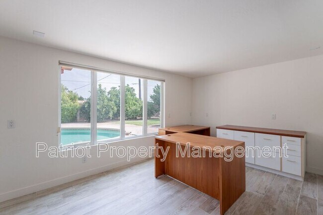 Building Photo - 7024 E Orange Blossom Ln