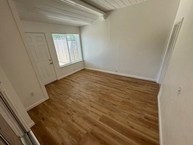 Building Photo - 3 Bed / 1 Bath | Del Dayo Duplex Available 08/10/2026