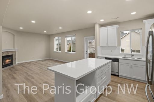 Building Photo - Gorgeous Updated 2012 Covington 4BR – New Paint, Floors, Cabinets, Quartz Counters +++