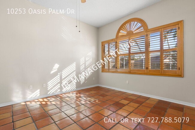 Building Photo - 10253 Oasis Palm Dr