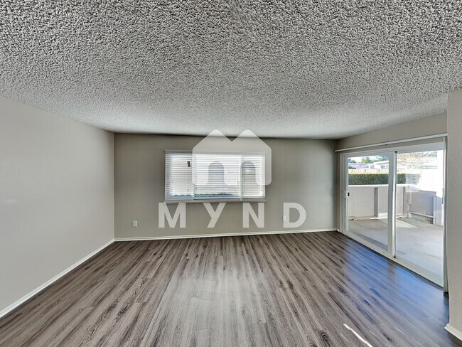 Building Photo - 6500 Country Club Dr Apt 1