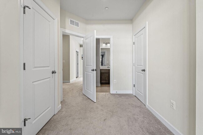 Building Photo - This beautiful 3 bed 2.5 bath 2-story condo provides a grand feeling with tall ceilings & over 16...