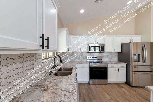 Building Photo - 3077 N Desert Stone Pl