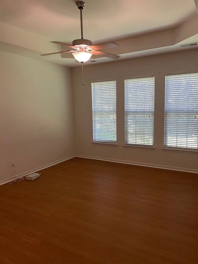 Building Photo - Available now. Great 4BR/3BA Home in Carol...