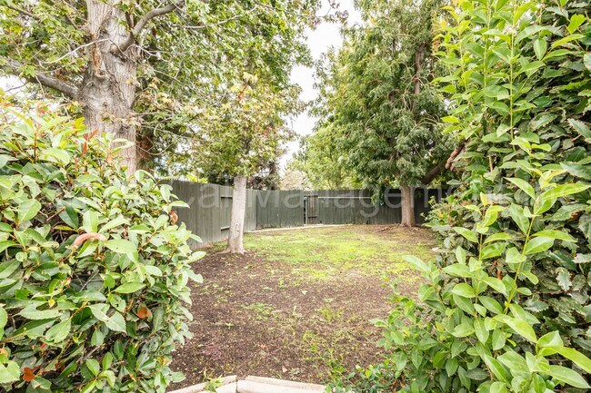 Building Photo - 4 Bedroom/2.5 Bath Home with Paid Solar an...