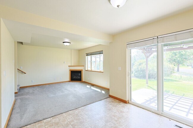 Building Photo - Refined Townhome with Gorgeous Landscaping...